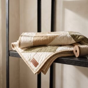 Quilt, hand-stitched in cotton and wool batting